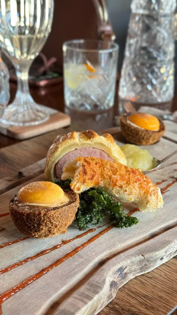 Trio of Pork (Chorizo and Black Pudding Scotch Egg, Apple and Thyme Sausage Roll, Cajun Crackling